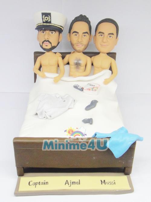 3 man on a bed cake topper