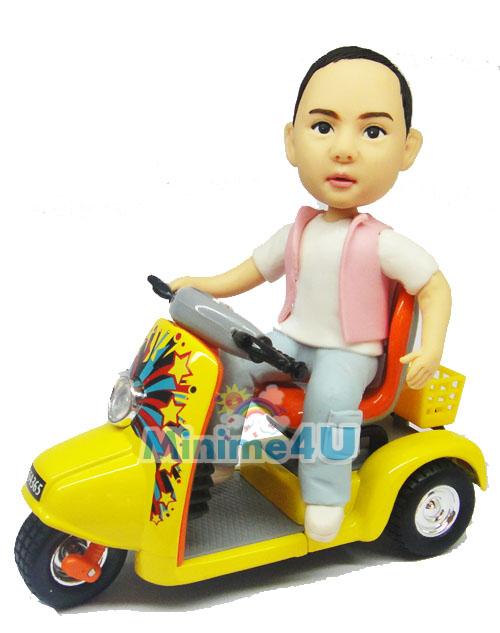 kid ride scooter figurine