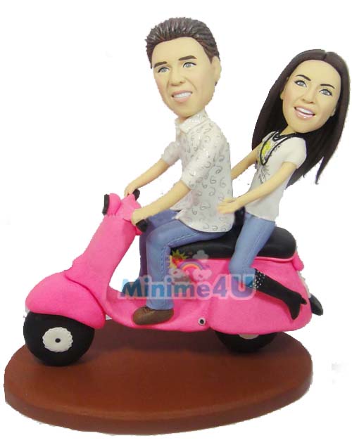 couple riding motor bike